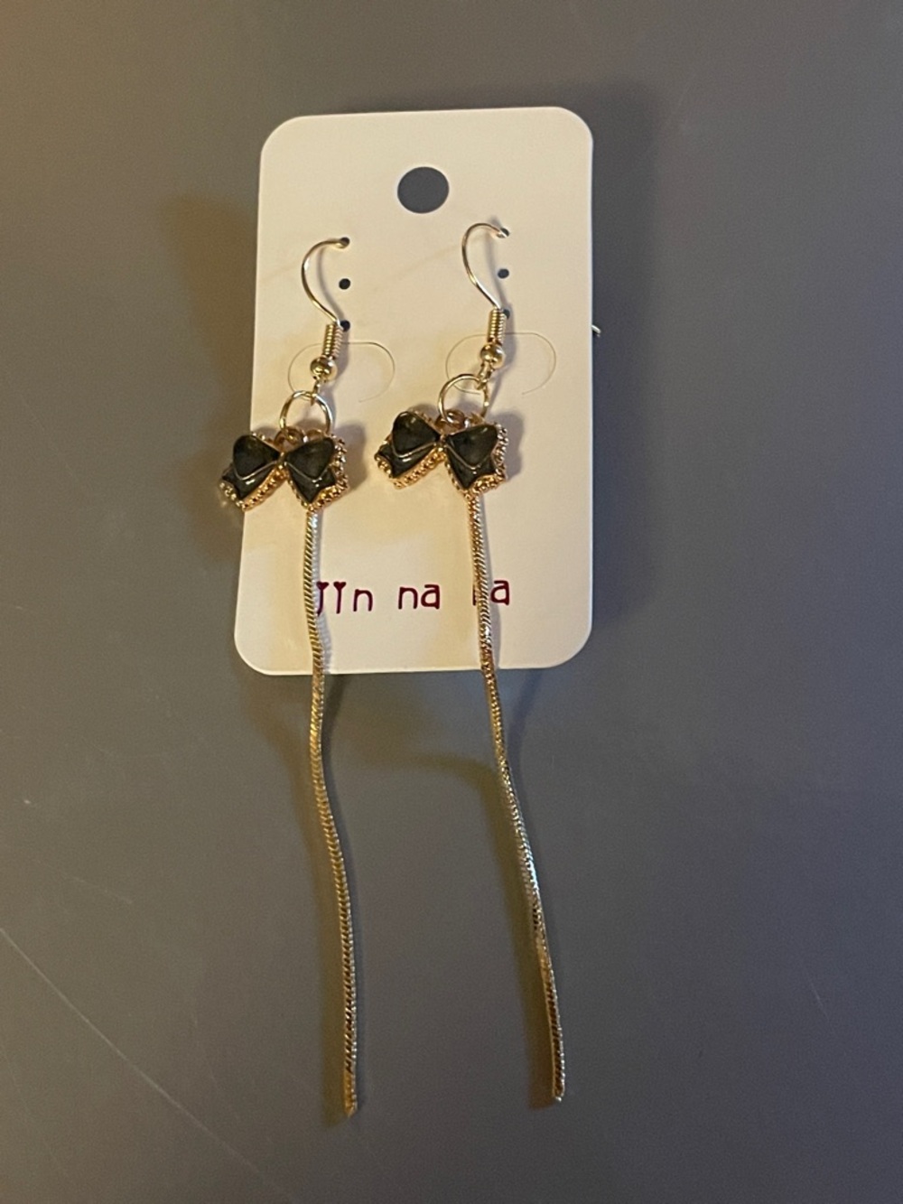 Jin na la bow dangle earrings